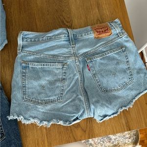 Three pairs of Levi’s jean shorts, size 27